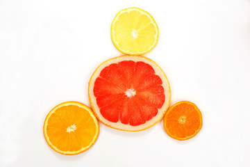 cut across different fruit on white background