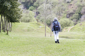 Fototapeta premium One person walking into the mountain.