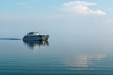 Fototapeta na wymiar Ship sailing on lake Baikal