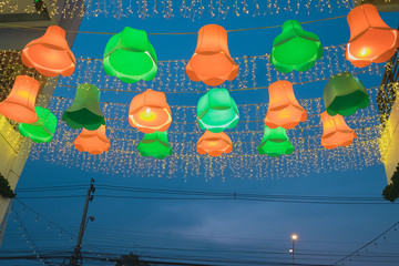 Orange and green beautiful lamp outdoor outside shopping mall night bazaar with electricity post and cable/Beautiful lamp outside shopping mall night bazaar 