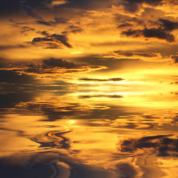 Natural background of the gold color sky and beautiful water reflection, During the time sunrise and sunset