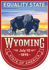 Вайоминг, эмблема штата США, зубр на рассвете на красном фоне