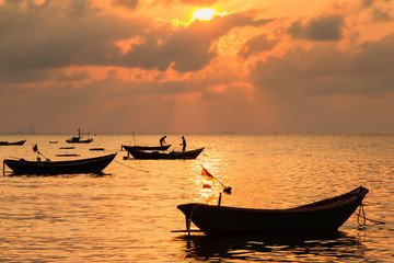 Fishing boats, small boats floating in the sea at sunrise, Conce