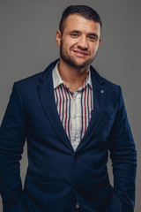 A man in a blue suit.