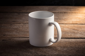 Cup of coffee on wooden table