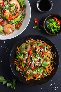 Bowl of soba noodles with beef and vegetables. Asian food.