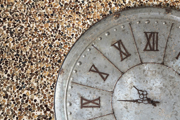 Wall clock old rusty grunge on stone wall background, (with clipping path)