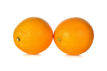 whole ripe orange on white background