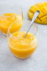 fresh mango smoothie in glass