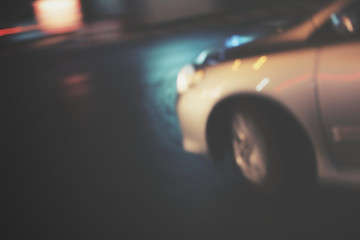 Fototapeta na wymiar Blurred of car in city at night
