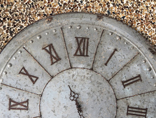 Wall clock old rusty grunge on stone wall background, (with clipping path)