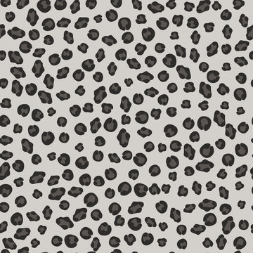 Seamless gray leopard fur pattern.