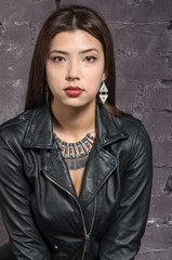 Asian girl wearing a black jacket