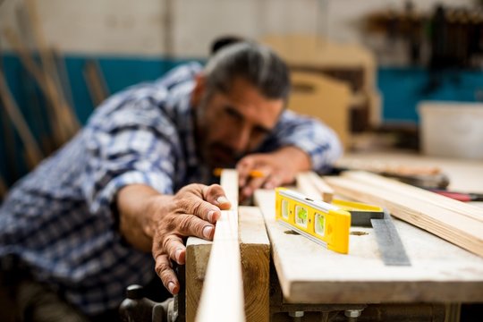 Male carpenter working in workshop