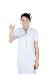 Smiling asian female nurse holding stethoscope isolated on white