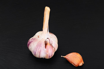 Garlic Head Isolated on Black Background.