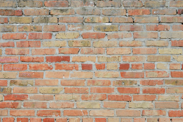 Fototapeta premium Brick texture with scratches and cracks