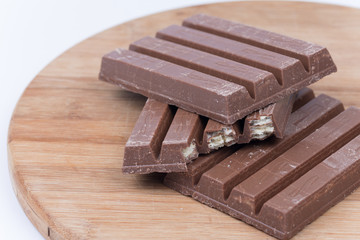 Chocolate bars with copy space over white