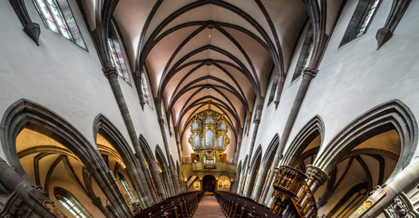 Panoramic interior view of medieval church in Ribeauville, Alsac