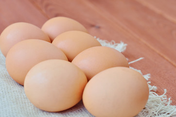 Eggs close-up on a napkin on a wooden table