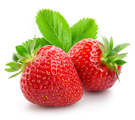 Two strawberries close up on white background