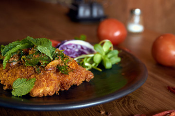 Larb dolly. Isaan (Northeast of Thailand) style fried dolly fish with herbs and onions