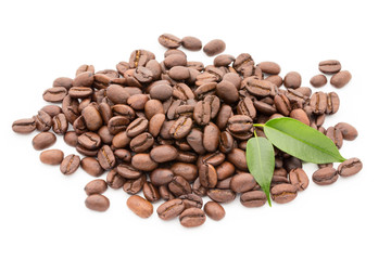 Coffee grains and leaves isolated on the white backgrounds.