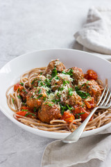 Whole grain spaghetti pasta  with beef meatballs and tomato sauc