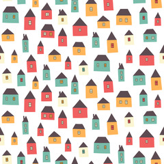 Cute cartoon pattern with tiny houses. Seamless vector background.