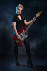 Fototapeta premium Rock star playing bass guitar