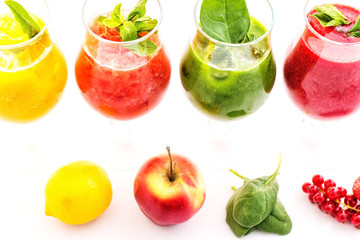 healthy colorful smoothies with fresh fruits isolated on white background. Detox and diet food concept and background