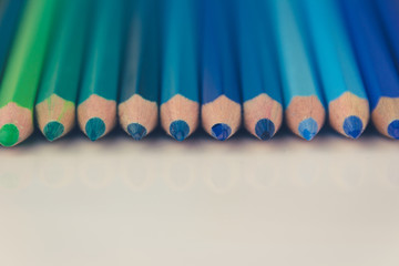 green, blue color pencils