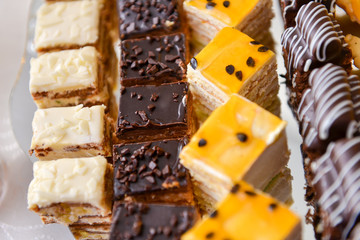 Different type of cakes with chocolate and vanilla