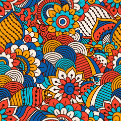Hand drawn seamless pattern with floral elements. Colorful ethnic background. Pattern can be used for fabric, wallpaper or wrapping