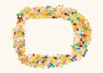 Heap of pills on white background