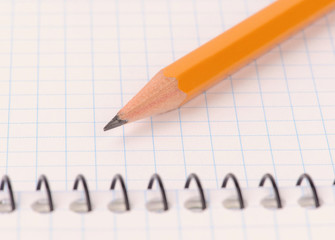 Notepad with pencil