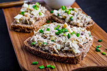 Sandwiches with a paste of smoked fish, cucumber, egg and mayonnaise