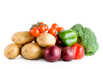 Fresh vegetables over white