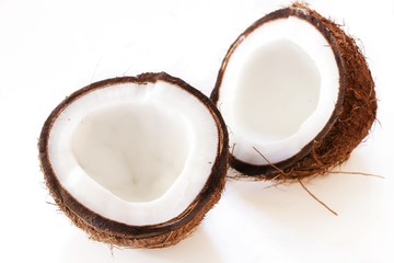 Coconut cut in half isolated on white