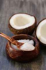 Coconut oil in a woodeen bowl, selective focus