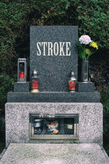 Stroke as civilization disease. Gravestone with text Stroke. Metaphor of victims who died or disease eradication by progress in medicine.