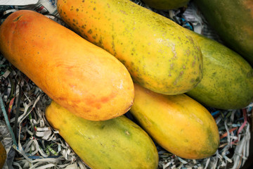 slices of sweet papaya on white background