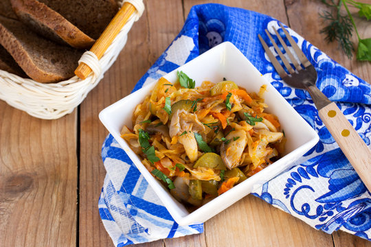 Cabbage stew with oyster mushrooms and pickles. Bigos - national Polish dish