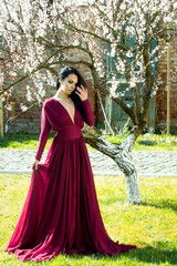 Girl near blooming tree