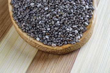Chia seeds in wooden spoon