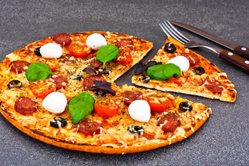 Pepperoni Pizza with Sausage, Cheese, Mozzarella, Olives and Bas