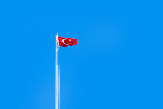 The flag of Turkey against the sky
