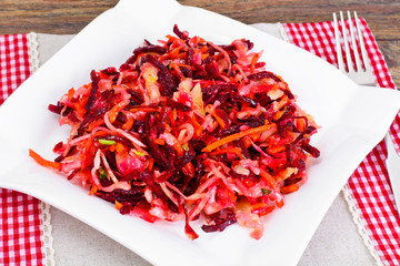 Healthy and Diet Food: Salad with Beets, Onions, Carrots