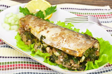 Mackerel Stuffed with Celery and Parsley in a Sauce of Coconut M