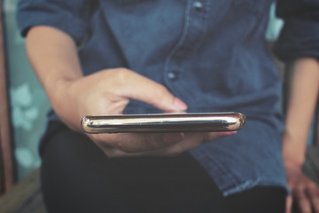 Woman using smart phone